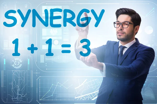 Businessman in the synergy business concept