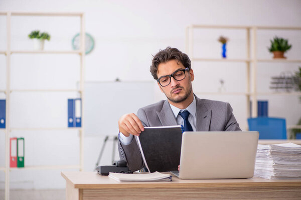 Young businessman employee working in the office