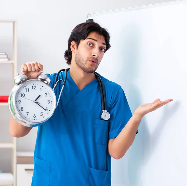 Young Male Doctor Front Whiteboard — Stockfoto