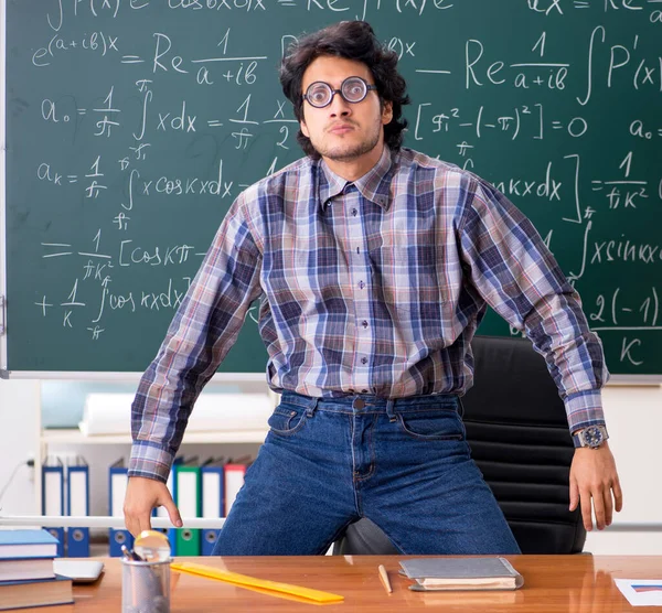 The funny male math teacher in the classroom