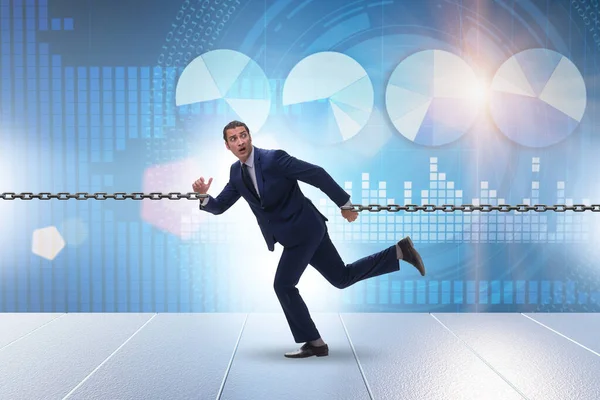 İşkolik kavramda zincirli iş adamı