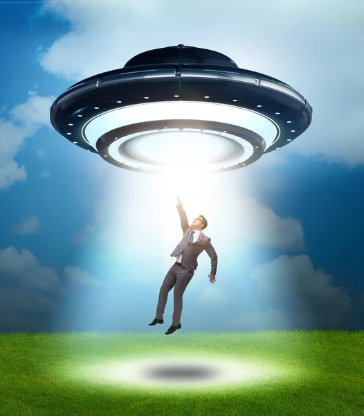 The flying saucer abducting young businessman