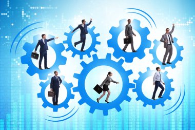 Takım çalışması konseptinde iş adamları