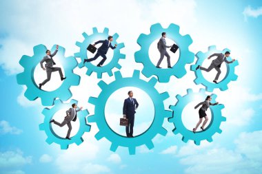 Takım çalışması konseptinde iş adamları