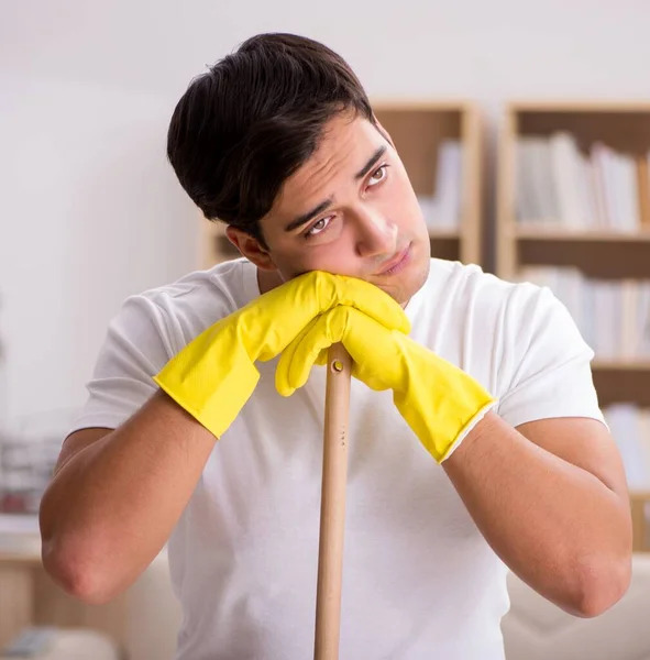 The man husband cleaning home in family concept