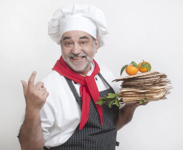 Smiling chef with matzot — Stock Photo, Image