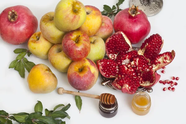 Świeże granaty, jabłko i miód na Rosz Haszana — Zdjęcie stockowe