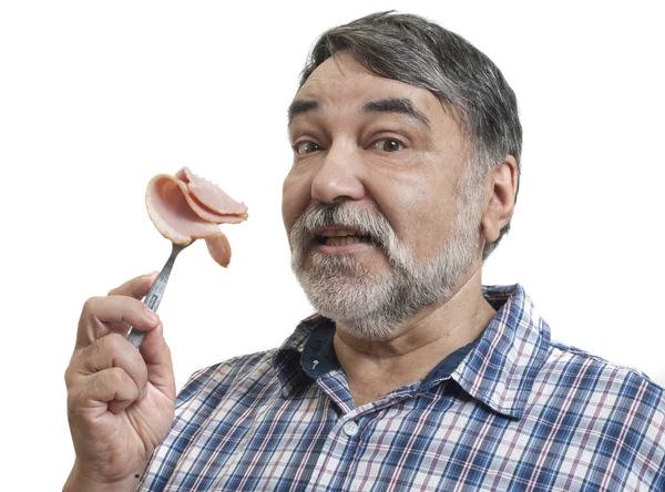 Hungry man eating sausage — Stock Photo, Image
