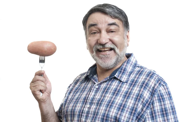 Homem segurando um garfo com batatas — Fotografia de Stock