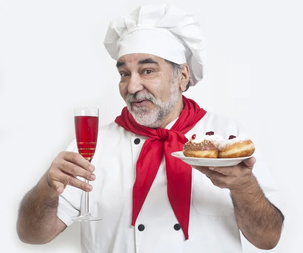 Chef com donuts Hanukkah — Fotografia de Stock