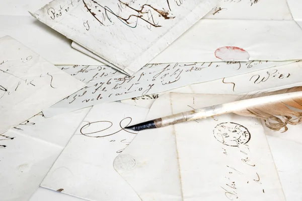 Nineteenth century letters with feather — Stock Photo, Image