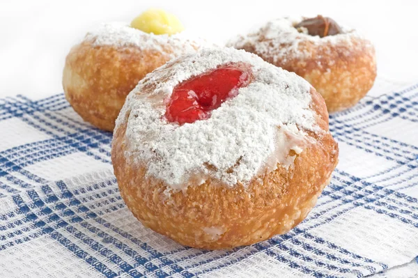 Hanukah doughnut on white plate — Stock Photo, Image