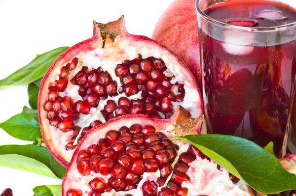 Ripe pomegranates and juice — Stock Photo, Image