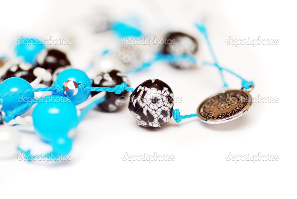Beautiful colorful beads on white background