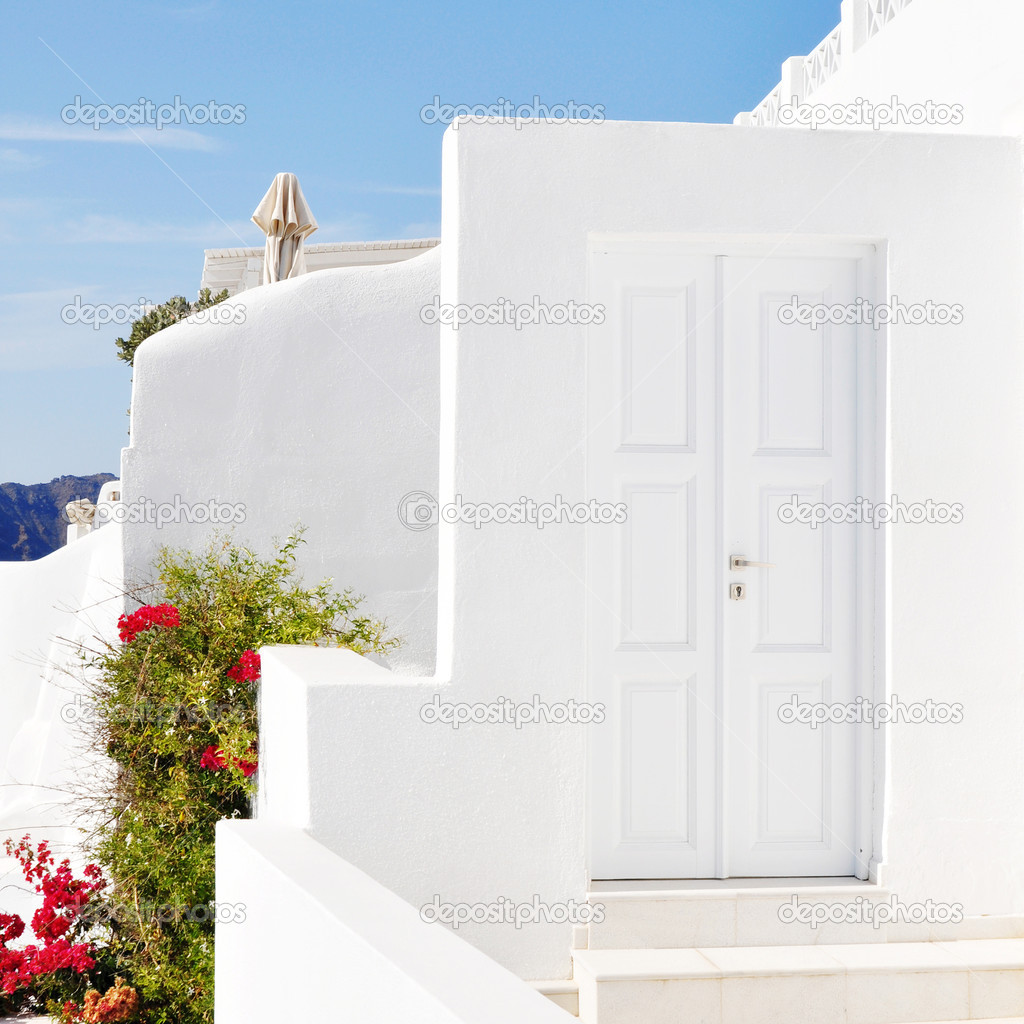Traditional Greek house against blue sky