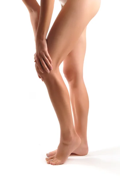 Acute pain in a knee at the young women — Stock Photo, Image