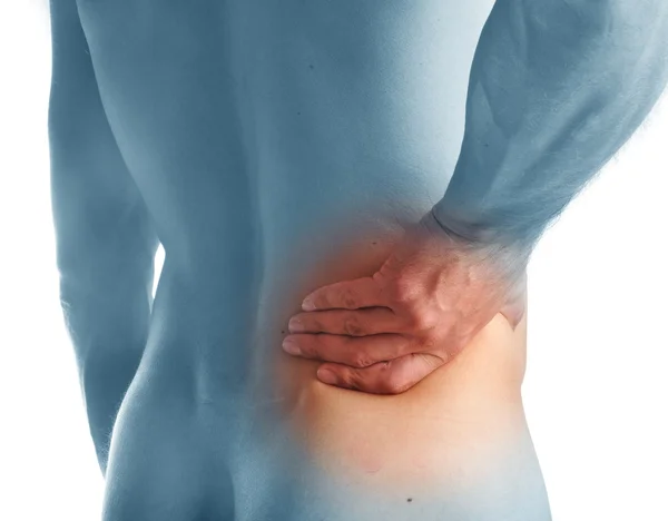 Young man with pain in a waist — Stock Photo, Image