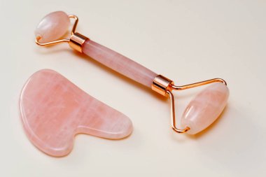 Gua Sha massager on color background 