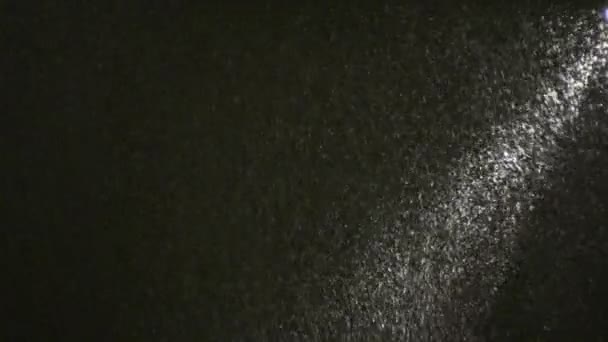 Neige en rayon de lumière. Nuit .