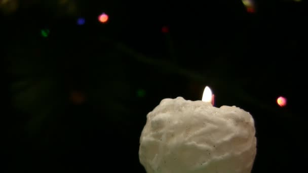 Flame of white candle blazes — Stock Video