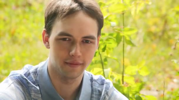 Portrait of young men on yellow background — Stock Video