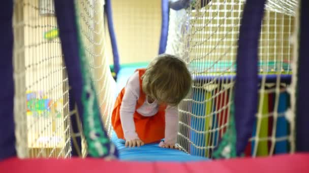 Little girl creep on footbridge — Stock Video