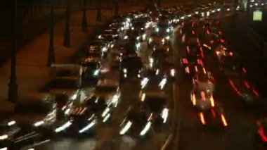 Part of brisk night movement of cars on modern highway. 