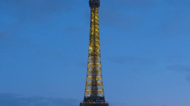 Tour Eiffel from above to a bottom, view of an evening city. 