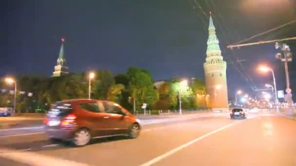 Car driving past by night Kremlin — Stock Video