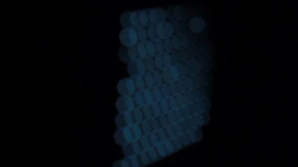 Panel consists of bright blue Light-emitting diodes rotates clockwise, out of focus — Stock Video