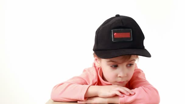 Girl in cap with inscription, I love you, on red LED display — Stock Video