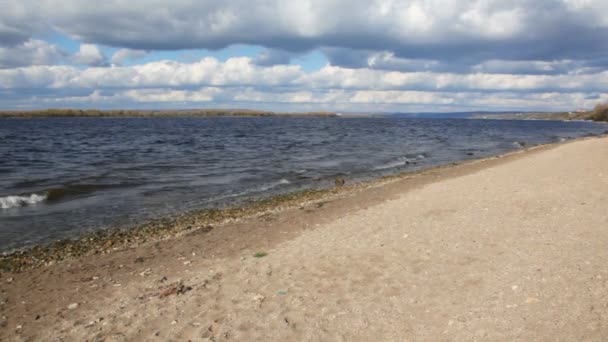 Autumn nature scene, sandy bank of river — Stock Video