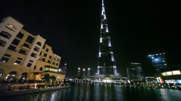 View from Burj Dubai Lake Bridge on skyscraper Burj Khalifa in Dubai, UAE. — Stock Video
