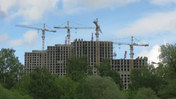 Building of modern houses against the summer sky. — Stock Video