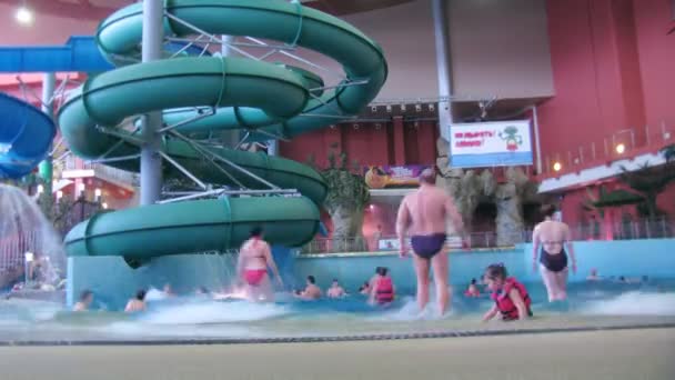 View on an aquapark through a lattice, outdoor in Sochi, Russia. — Stock Video