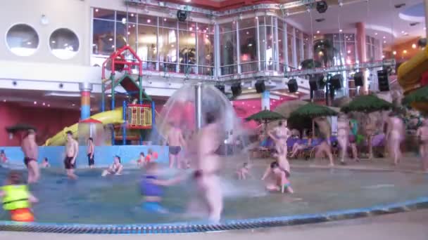 View on an aquapark through a lattice, outdoor in Sochi, Russia. — Stock Video