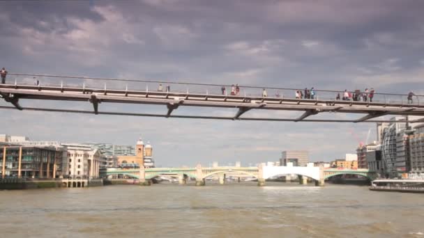Walking across River Thames on London Millennium Footbridge — Stock Video