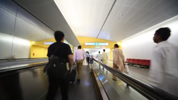 On travelator in Dubai International Airport — Stock Video