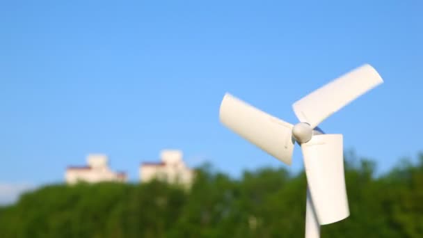 White tiny wind driven generator rotating — Stock Video