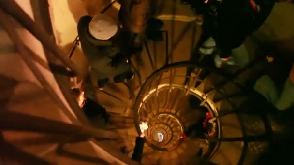 Ascending narrow spiral staircase in old building — Stock Video