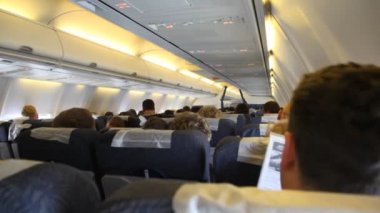 sitting in airplanes board