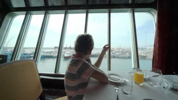 Boy having breakfast in cruise ship — Stock Video