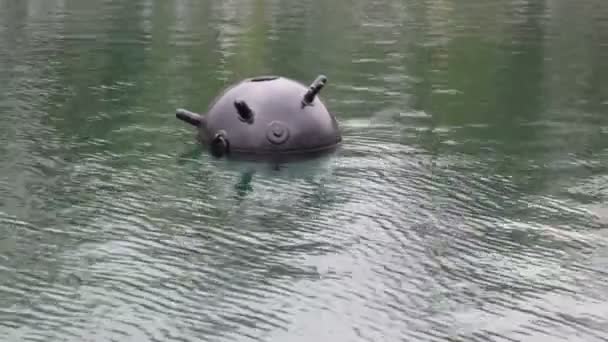 Sea mine on water surface of navy exhibition — Stock Video