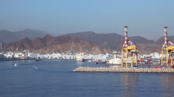 Seaport of Muscat, Oman, view from moving ship — Stock Video