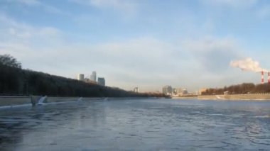 View from boat on icy Moskva-river, time lapse