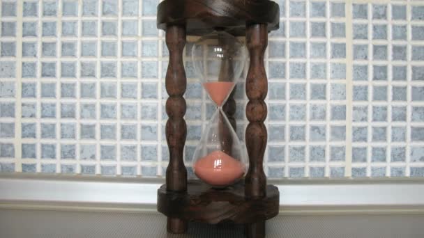 Close-up view on wooden sandglass running, time lapse — Stock Video