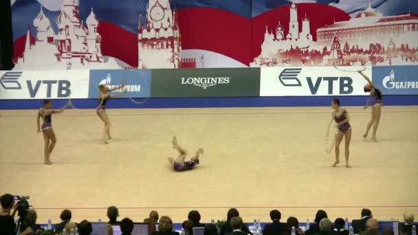 Gymnasts with hoops on XXX World Rhythmic Gymnastics Championship. — Stock Video