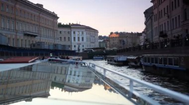 Boat floats on river channel to St. Petersburg
