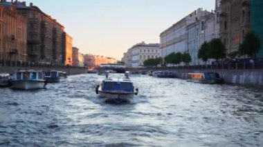 Boat floats on river channel to St. Petersburg