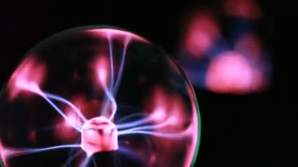 Plasma ball on black, energy lines move inside — Stock Video